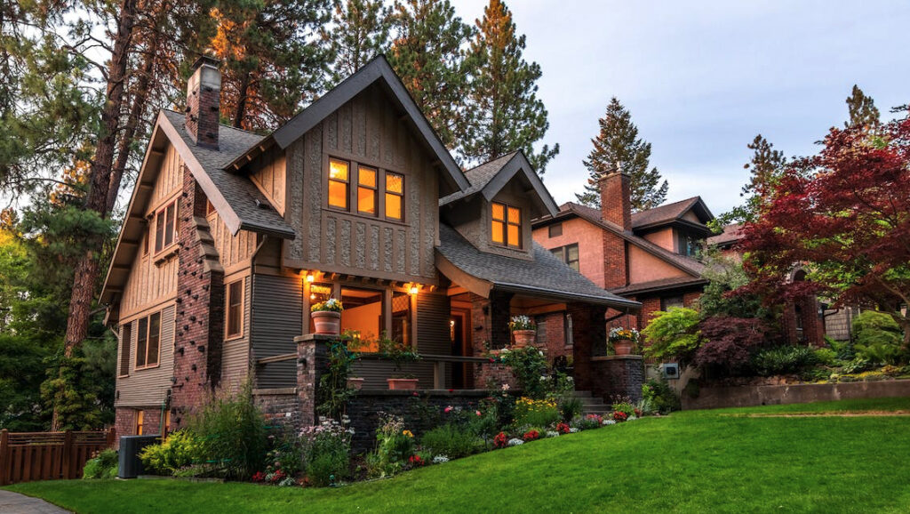 house landscape with flower bed at entrance